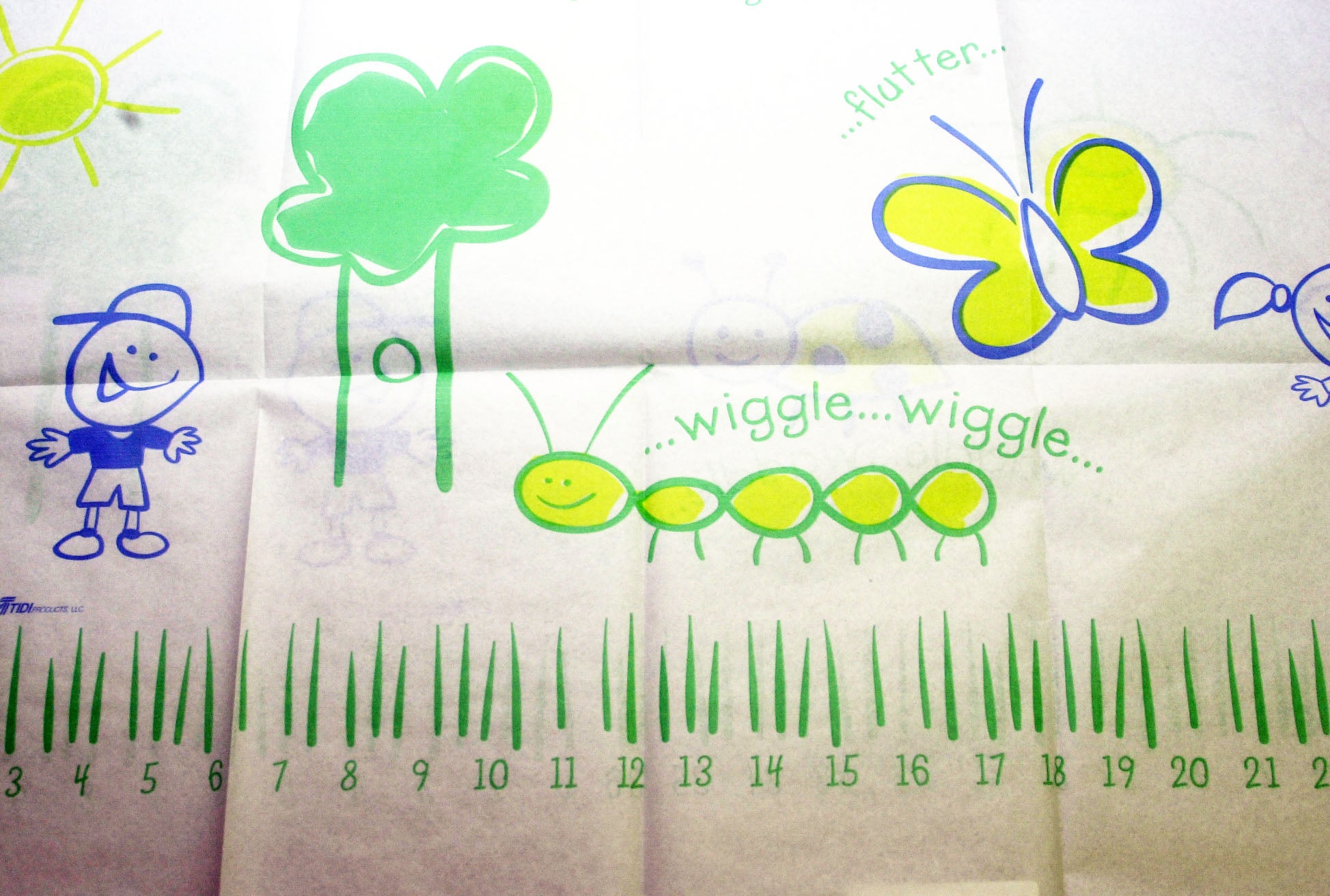 Tidi® Choice Table Paper 18" x 125' Bugs and Things Print