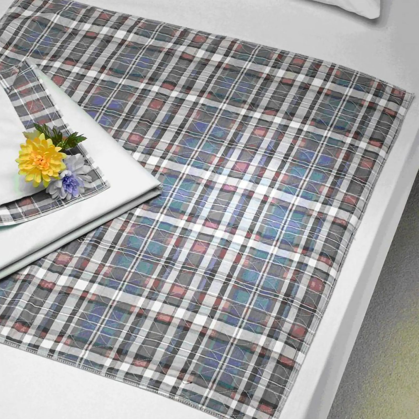 Underpad with Tuckable Flaps