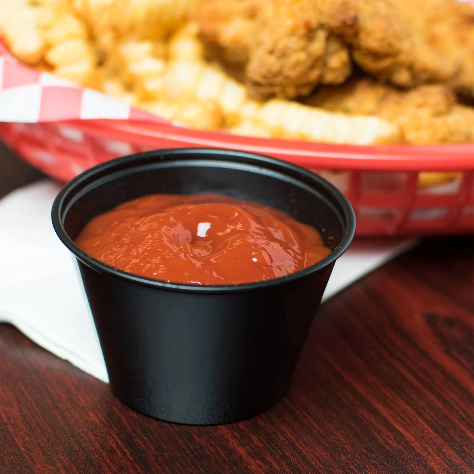Solo® 4 oz. Black Plastic Souffle Cup