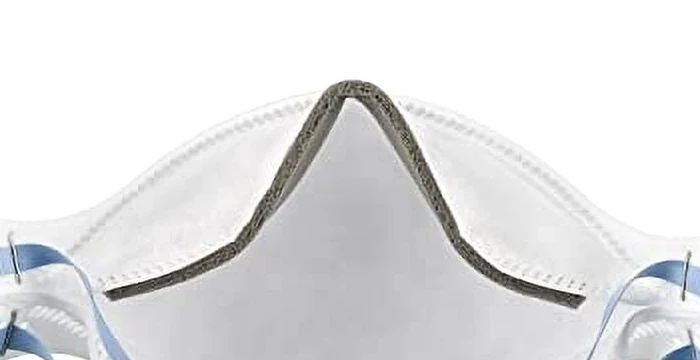 Macro close-up of the soft nose foam along the top inner edge of the 3M Aura 9205 Plus N95 respirator