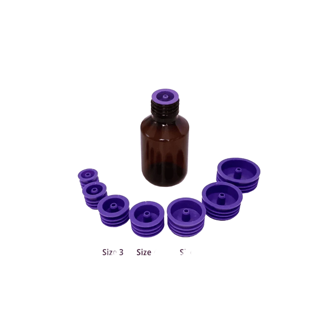 Vesco Medical ENFit medication bottle adapters in seven purple neck sizes arranged around an amber medicine bottle