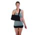 Person wearing the Procare Deluxe black arm sling with padded shoulder strap