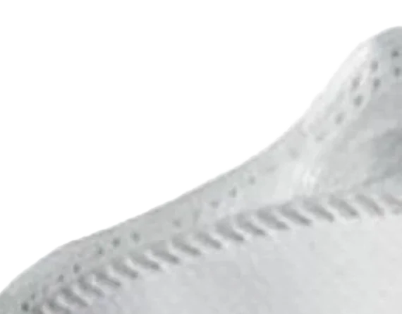 3M Aura 1870+ N95 surgical respirator close-up of the sculpted nose panel and welded top-panel seam