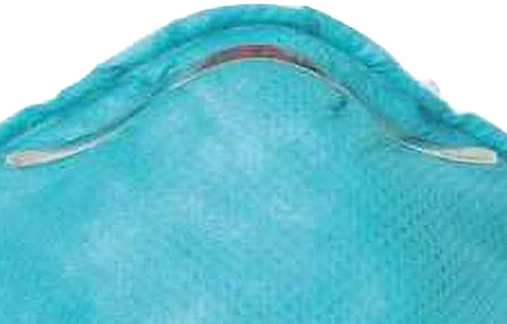 Close-up of the adjustable aluminum nose clip on the 3M 1860 N95 respirator