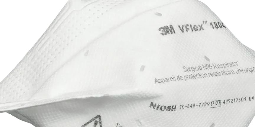Close-up of the 3M VFlex 1804 respirator showing the signature V-shaped pleats and fold