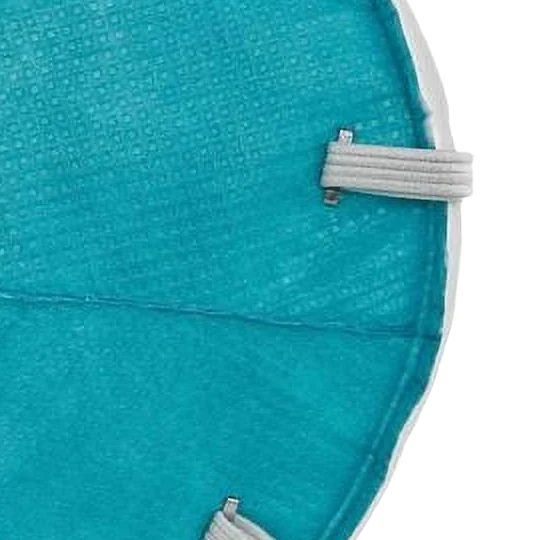 Close-up of the 3M 1860 N95 respirator fluid-resistant woven outer surface and molded seam