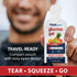 Person holding a travel-ready TRUEplus glucose gel fruit punch pouch with easy-open design