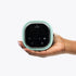 Zomee Z2 motor unit — compact, palm-sized design